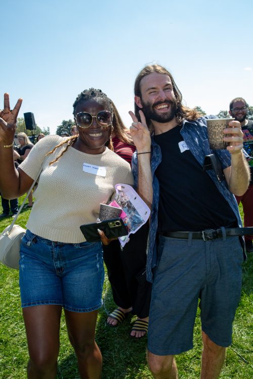 Two students posing and smiling at the camera.