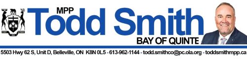 Banner featuring Todd Smith, MPP for Bay of Quinte. The banner includes Todd Smith's name in large blue text with a small photo of him in a suit and tie on the right. On the left is a coat of arms. Below, there is contact information: 5503 Hwy 62 S, Unit D, Belleville, ON K8N 0L5, phone number 613-962-1144, email todd.smithco@pc.ola.org, and website toddsmithmpp.ca.