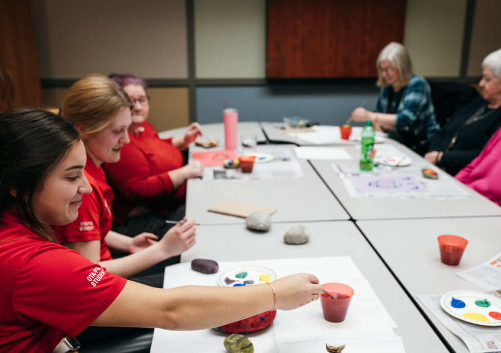 Students in Loyalist's OTA/PTA program facilitate a hands-on art therapy workshop for stroke rehabilitation.