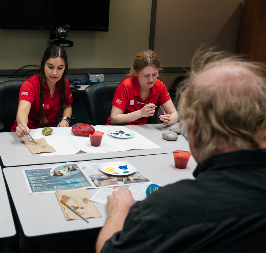 Students in Loyalist's OTA/PTA program facilitate a hands-on art therapy workshop for stroke rehabilitation.