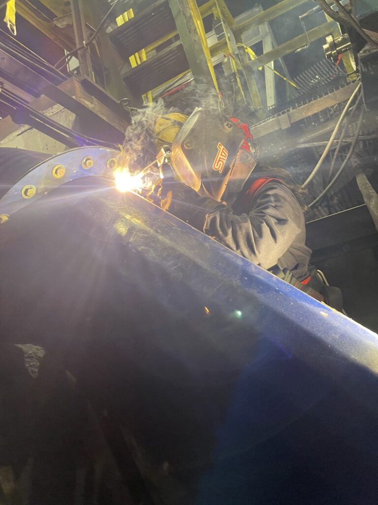Loyalist College professor Emma Holdbeck at work in the welding lab.