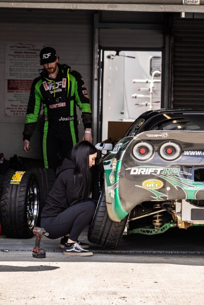 Loyalist College welding professor Emma Holdbeck's works on fiance Josiah Fallaise's car at Shannonville Motorsport Park.