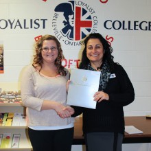 Bancroft PSW student Jenna Scott receives the Chester Schwandt Bursary from Loyalist College Governor Mary Lynn Rutledge 