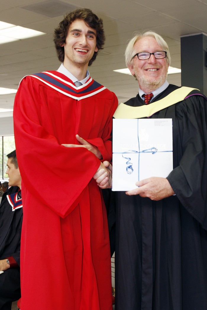 Architectural Technology graduate at Loyalist College Kenneth Wells is presented with three awards — the Architectural Faculty Award for Best Working Drawings; the Association of Architectural Technologists of Ontario Award; and the Northumberland Society Architects Award during the fourth and last Convocation Ceremony held at Loyalist College in Belleville, Ontario Friday, June 5, 2015. – LOYALIST COLLEGE PHOTO