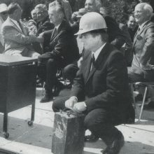 William G. Davis pushing the plunger at the sod-blasting ceremony to start the construction of the permanent building.