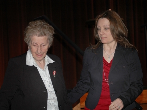 Shown in photo with Eva Olsson is Loyalist Professor Melanie Rabishaw.