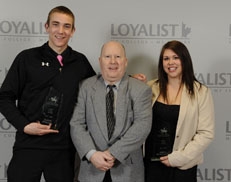 The Larry Cook Award was presented to Justin deHaan and Robyn Beauchamp, as the student athletes who best exemplify the values of fair play, integrity and commitment. The award was presented by Larry Cook (centre).
