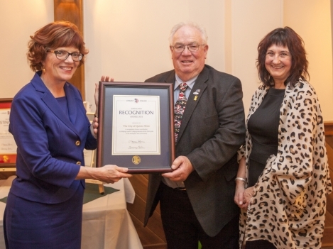 Loyalist College President Maureen Piercy (left) and Alumni Association President Rosemary Rooke present the City of Quinte West Employer Recognition Award to Councillor Jim Harrison.