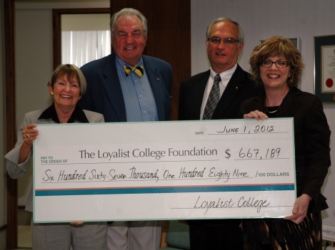Photo (L-R): Loyalist Foundation Chair Beverley Townsend, Chair of the Board of Governors Stuart Wright, Foundation Vice-Chair Bernie Ouellet, and College President Maureen Piercy celebrate the contributions to the endowment fund, transferred from the College to the Foundation at the Annual Meeting.<br />
” style=”margin: 0px” title=”Photo (L-R): Loyalist Foundation Chair Beverley Townsend, Chair of the Board of Governors Stuart Wright, Foundation Vice-Chair Bernie Ouellet, and College President Maureen Piercy celebrate the contributions to the endowment fund, transferred from the College to the Foundation at the Annual Meeting.<br />
” /></p>
<p><i>Photo (L-R): Loyalist Foundation Chair Beverley Townsend, Chair of the Board of Governors Stuart Wright, Foundation Vice-Chair Bernie Ouellet, and College President Maureen Piercy celebrate the contributions to the endowment fund, transferred from the College to the Foundation at the Annual Meeting.</i>
</p>
<p></p>
<p align=